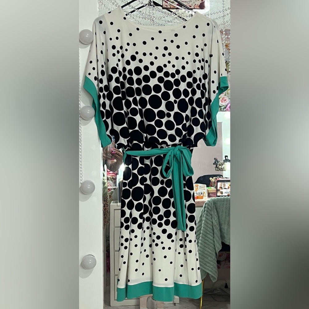 Polka dotted dress with teal accents